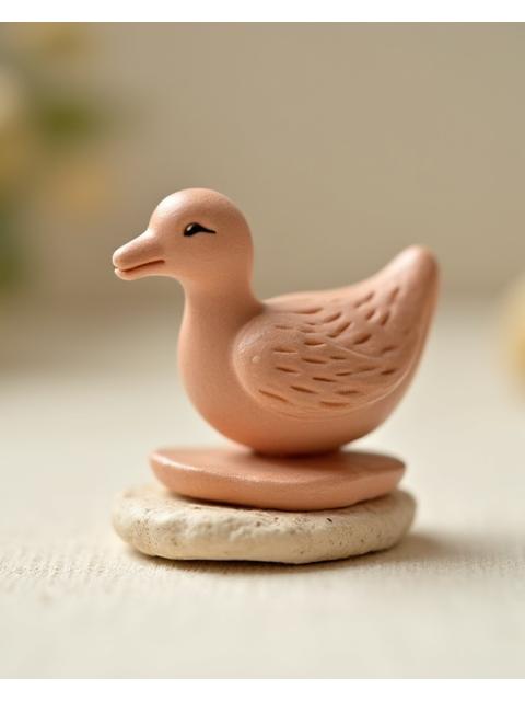 Klein keramisch beeldje van een vogel
